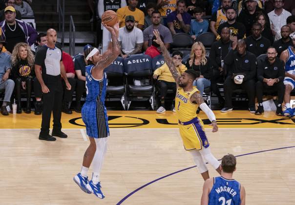 October 30, 2023, Los Angeles, California, USA: Jonathan Isaac 1 of the Los Angeles Lakers tries to block a shot by Paolo Banchero 5 of the Orlando Magic during their regular season game on Tuesday October 31, 2023 at Crypto.com Arena in Los Angeles, California. Lakers defeat Magic, 106-103. BURT HARRIS PI Los Angeles USA - ZUMAp124 20231030_zaa_p124_111 Copyright: xJavierxRojasx