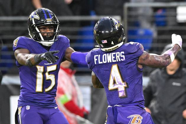 Baltimore Ravens wide receiver Zay Flowers (4) celebrates with teammate Nelson Agholor (15) after a 21-yard touchdown against the Los Angeles Rams during the second half at M&T Bank Stadium in Baltimore, Maryland, on Sunday, December 10, 2023. Baltimore won 37-31. BAL20231210127 DAVIDxTULIS