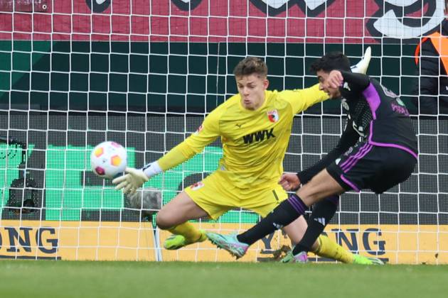 Aleksandar Pavlovic FC Bayern Munich scores to 0 1 against Finn Dahmen Goalkeeper FC Augsburg 1 FC Augsburg vs FC Bayern Munich, Matchday 19 DFL REGULATIONS PROHIBIT ANY USE OF PHOTOGRAPHS AS IMAGE SEQUENCES AND OR QUASI VIDEO
