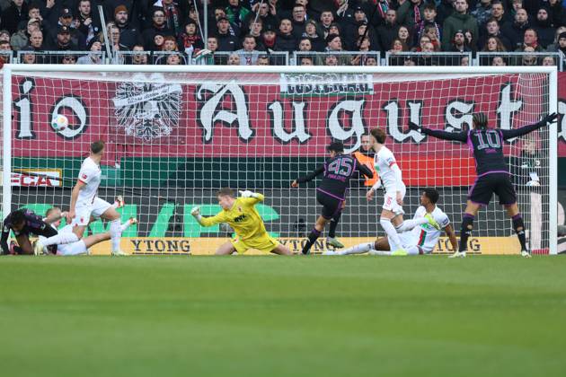 Aleksandar Pavlovic FC Bayern Munich scores to 0 1 against Finn Dahmen Goalkeeper FC Augsburg 1 FC Augsburg vs FC Bayern Munich, Matchday 19 DFL REGULATIONS PROHIBIT ANY USE OF PHOTOGRAPHS AS IMAGE SEQUENCES AND OR QUASI VIDEO