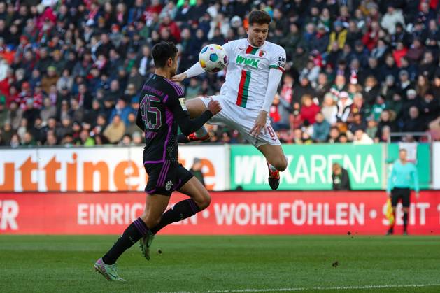in duel, action, with Alexandar Pavlovic 45 FC Bayern Muenchen , Elvis Rexhbecaj 8 FC Augsburg , FC Augsburg vs FC Bayern Muenchen, Soccer, 1 Bundesliga, 19 Matchday, 27 01 2024 DFB regulations prohibit any use of photographs as image sequences and or quasi video Augsburg Bayern Germany Copyright: xkolbert-press ChristianxKolbertx