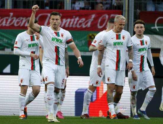 10 02 2024, Soccer 1 Bundesliga, 21 Matchday FC Augsburg RB Leipzig, 2023 2024, in the WWK Arena Augsburg from left Dion Drena Beljo FC Augsburg , Ermedin Demirovic FC Augsburg cheers, Jeffrey Gouweleeuw FC Augsburg , Philip Tietz FC Augsburg and Ruben Vargas FC Augsburg For journalistic purposes only Only for editorial use DFL regulations prohibit any use of photographs as image sequences and or quasi video