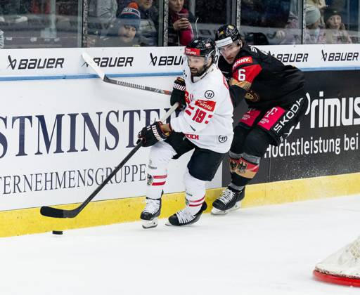 Battle for the puck duel between Dominique Heinrich Team Austria, 19 and Julius Karrer Team Germany, 6 GER, Germany vs Austria, ice hockey, test match, World Championship preparation 2024, 25 04 2024 GER, Germany vs Austria, ice hockey, test match, World Championship preparation 2024, 25 04 2024 Garmisch Partenkirchen Copyright: xEibner-Pressefoto FranzxFeinerx EP_HFR
