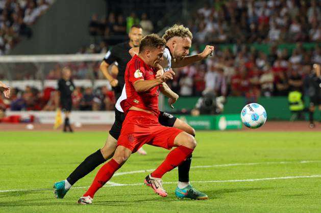 in duel, action, with Joshua Kimmich 6 FC Bayern Muenchen , Philipp Strompf 32 SSV Ulm 1846 , SSV Ulm 1846 vs FC Bayern Muenchen, Football, DFB Pokal, 1 Runde, 16 08 2024 DFB regulations prohibit any use of photographs as image sequences and or quasi video Ulm Baden Wuerttemberg Germany Copyright: xkolbert-press ChristianxKolbertx