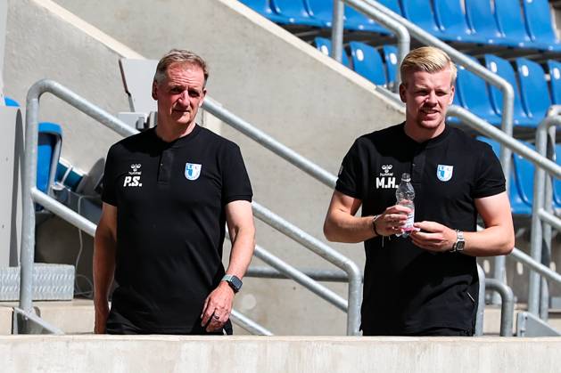 Coach Petrik Sander 1 FC Magdeburg and goalkeeper coordinator Maximilian Heidel 1 FC Magdeburg Football NOFV Oberliga Süd portrait appointment 2023 2024 official photo session 1 FC Magdeburg U23 at the MDCC Arena in Magdeburg Germany, Football, Men, GER, 26 07 2023 Christian Schroedter