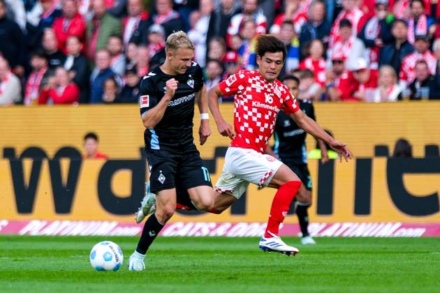 Marco Gruell SV Werder Bremen, 17 in duel with Kaishu Sano 1 FSV Mainz 05, 06 , GER, 1 FSV Mainz 05 vs SV Werder Bremen, Soccer, 1 Bundesliga, Matchday 3, Season 2024 2025, 15 09 2024 DFL DFB REGULATIONS PROHIBIT ANY USE OF PHOTOGRAPHS as IMAGE SEQUENCES and or QUASI VIDEO GER, 1 FSV Mainz 05 vs SV Werder Bremen, Football, 1 Bundesliga, Matchday 3, Season 2024 2025, 15 09 2024 Mainz Copyright: xEibner-Pressefoto FlorianxWieganx EP_FWD