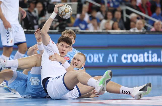 HC Zagreb v Aalborg Handbold - EHF Champions League ZAGREB, CROATIA - SEPTEMBER 18: Luka Lovre Klarica of HC Zagreb is challenged by Felix Moller of Aalborg Handbold and Thomas Arnoldsen of Aalborg Handbold during EHF Champions League Group Phase match between HC Zagreb and Aalborg Handbold at Arena Zagreb on September 18, 2024 in Zagreb, Croatia.  SanjinxStrukic PIXSELL