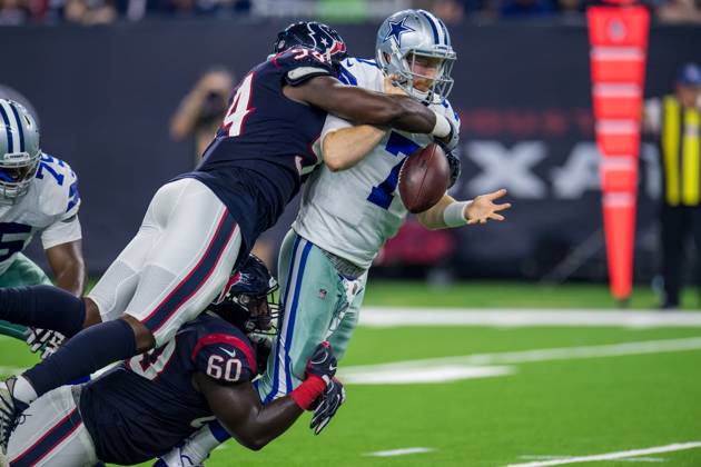 NFL, American Football Herren, USA 2018: Cowboys vs Texans AUG 30 August 30, 2018: Houston Texans linebacker Ufomba Kamalu (94) and Houston Texans defensive tackle Kingsley Opara (60) strip-sack Dallas Cowboys quarterback Cooper Rush (7), but the play was called back for a penalty, during the 2nd quarter of a preseason NFL football game between the Houston Texans and the Dallas Cowboys at NRG Stadium in Houston, TX. ..Trask Smith CSM Houston TX U.S. EDITORIAL USE ONLY Copyright: xx ZUMA-20180830_zaf_c04_065.jpg TraskxSmithx csmphototwo422617