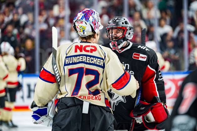 Ice Hockey Penny DEL 3 Matchday Cologne Sharks Nuremberg Ice Tigers on 27 09 2024 at the Lanxess Arena in Cologne Leon Hungerecker Nuremberg , left and Niklas Lunemann Cologne , right high-five each other after the game According to the regulations of the DEL German Ice Hockey League, the publication and further use of the recordings in electronic media and end devices of all kinds during the ongoing game is not permitted xDMx