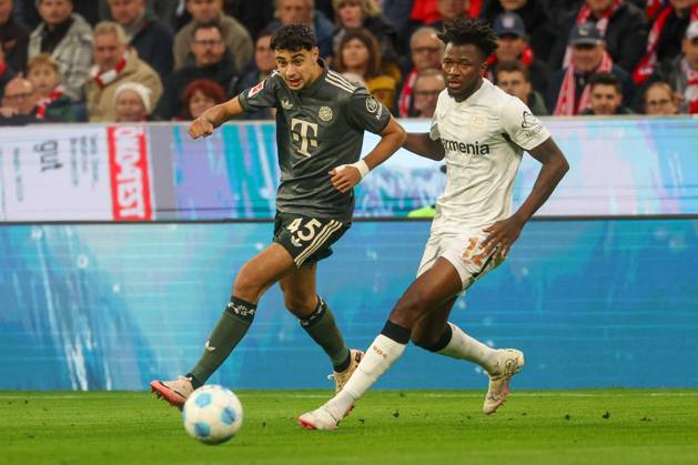 in duel, action, with Alexandar Pavlovic 45 FC Bayern Muenchen , Edmond Tapsoba 12 Bayer 04 Leverkusen , FC Bayern Muenchen vs Bayer 04 Leverkusen, Football, 1 Bundesliga, 5 Matchday, 28 09 2024 DFB regulations prohibit any use of photographs as image sequences and or quasi video Muenchen Bayern Germany Copyright: xkolbert-press ChristianxKolbertx