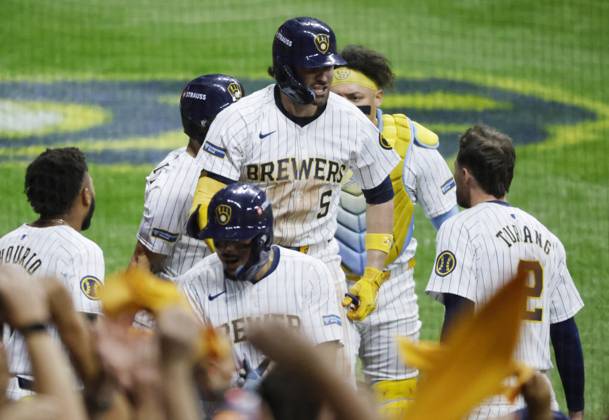 Milwaukee Brewers Garrett Mitchel celebrates with teammates after hitting a two-run home run in the eighth inning against the New York Mets to give the Brewers a 5-3 lead in game two of the MLB, Baseball Herren, USA National League Wild Card series at American Family Field in Milwaukee, Wisconsin on Wednesday, October 2, 2024. The Brewers won 5-3 and the best of three series is now tied 1-1. MIL20241002847 TANNENxMAURY