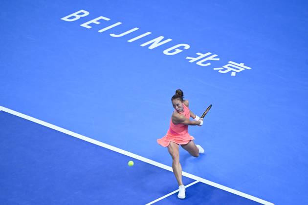 (241005) -- BEIJING, Oct. 5, 2024 -- Zheng Qinwen hits a return during the women s singles semifinal match between Zheng Qinwen of China and Karolina Muchova of the Czech Republic at 2024 China Open tennis tournament in Beijing, capital of China, Oct. 5, 2024. ) (SP)CHINA-BEIJING-TENNIS-CHINA OPEN-WOMEN S SINGLES(CN) ZhangxLong