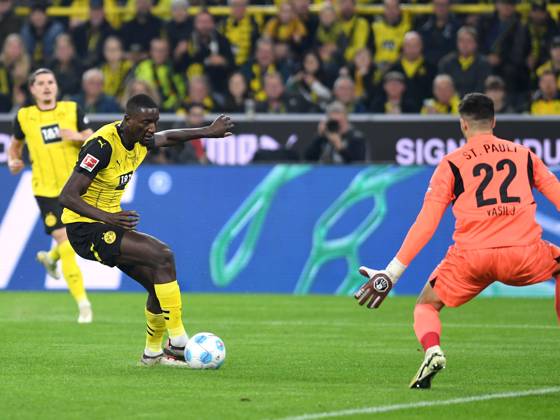 Serhou Guirassy Borussia Dortmund and goalkeeper Nikola Vasilj FC St Pauli battle for the ball during the Bundesliga match between Borussia Dortmund and FC St Pauli 1910, SIGNAL IDUNA PARK on October 18, 2024 in Dortmund, Germany, Germany Photo by Ralf Treese DeFodi Images Serhou Guirassy Borussia Dortmund and goalkeeper Nikola Vasilj FC St Pauli battle for the ball during the Bundesliga match between Borussia Dortmund and FC St Pauli 1910 at Signal Iduna Park on October 18, 2024 in Dortmund, Germany Photo by Ralf Treese DeFodi Images DFL regulations prohibit any use of photographs as image sequences and or quasi video not used in POL SRB CRO FRA GBR NED ITA USA Defodi 521 BVBSTP20241018 059 Defodi-521 not used in POL SRB CRO FRA GBR NED ITA USA DFL regulations prohibit any use of photographs as image sequences and or quasi-video.