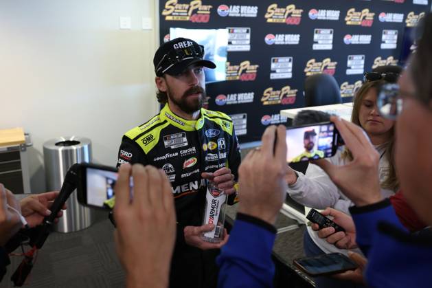 LAS VEGAS, NV - OCTOBER 19: Ryan Blaney ( 12 Team Penske Menards Great Stuff Ford) answers questions from members of the media during a media bullpen before practice and qualifying for the South Point 400 NASCAR, Motorsport, USA Cup Series playoff race on October 19, 2024, at Las Vegas Motor Speedway in Las Vegas, NV. (Photo by Marc Sanchez LVMS Icon Sportswire) AUTO: OCT 19 NASCAR Cup Series South Point 400 EDITORIAL USE ONLY Icon144241019030