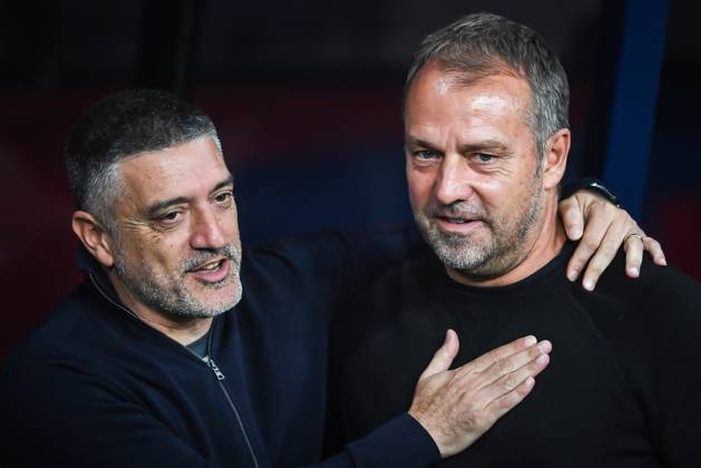 October 20, 2024, Barcelona, Barcelona, Spain: Xavier GARCIA PIMIENTA of Sevilla FC and Hansi FLICK of Barcelona during the LaLiga match between FC Barcelona, Barca and Sevilla FC at Estadi Olimpic Lluis Companys on October 20, 2024 in Barcelona, Spain. Barcelona Spain - ZUMAm308 20241020_zsp_m308_036 Copyright: xMatthieuxMirvillex