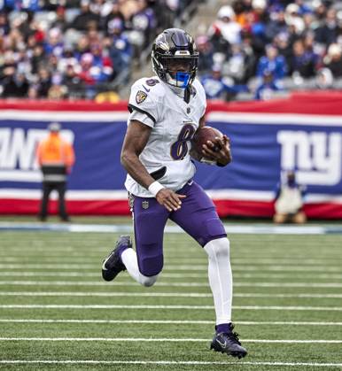 Baltimore Ravens quarterback Lamar Jackson (8) scrambles for yardage against the New York Giants during a NFL, American Football Herren, USA game at MetLife Stadium in East Rutherford, New Jersey. CSM East Rutherford United States - ZUMAc04_ 20241215_zma_c04_125 Copyright: xDuncanxWilliamsx