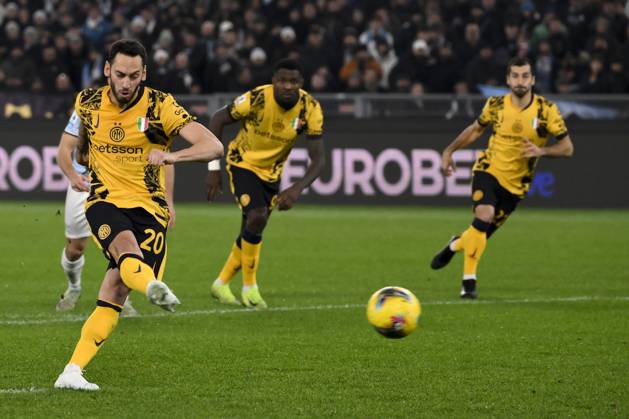 Hakan Calhanoglu of FC Internazionale scores on penalty the goal of 0-1 during the Serie A football match between SS Lazio and FC Internazionale at Olimpico stadium in Rome (Italy), December 16, 2024. AndreaxStaccioli