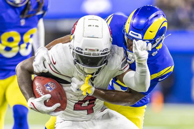 NFL, American Football Herren, USA 2024: Los Angeles Rams Vs Arizona Cardinals in Los Angeles - 28 Dec 2024 Arizona Cardinals wide receiver Greg Dortch 4 is stopped by Los Angeles Rams wide receiver Xavier Smith 19 during an NFL football game at SoFi Stadium. Los Angeles United States Copyright: xRingoxChiux xSOPAxImagesx 20241228RC.Rams106