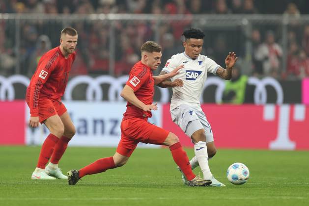 in duel, action, with Joshua Kimmich 6 FC Bayern Muenchen , Gift Orban 14 TSG 1899 Hoffenheim , FC Bayern Muenchen vs TSG 1899 Hoffenheim, Football, 1 Bundesliga, 17 Matchday, 15 01 2025 DFB regulations prohibit any use of photographs as image sequences and or quasi video Muenchen Bayern Germany Copyright: xkolbert-press ChristianxKolbertx