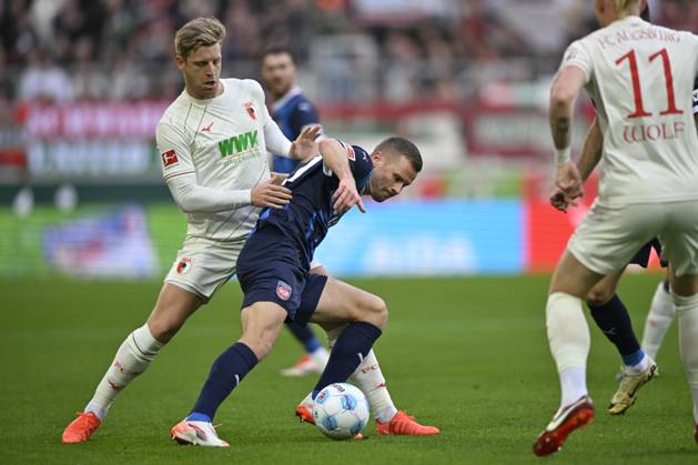 duel, action Budu Zivzivadze Siwsiwadse 1 FC Heidenheim 1846 FCH 12 vs Arne Maier FC Augsburg FCA 10 FC Augsburg FCA vs 1 FC Heidenheim FCH 25 01 2025 DFL REGULATIONS PROHIBIT ANY USE OF PHOTOGRAPHS AS IMAGE SEQUENCES AND OR QUASI VIDEO FC Augsburg FCA vs 1 FC Heidenheim FCH