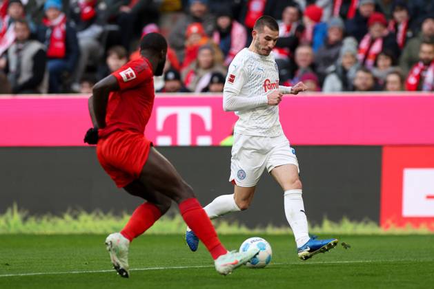 in duel, action, with Dayot Upamecano 2 FC Bayern Muenchen , David Zec 26 Holstein Kiel , FC Bayern Muenchen vs Holstein Kiel, Soccer, 1 Bundesliga, 20 Matchday, 01 02 2025 DFB regulations prohibit any use of photographs as image sequences and or quasi video Muenchen Bayern Germany Copyright: xkolbert-press ChristianxKolbertx