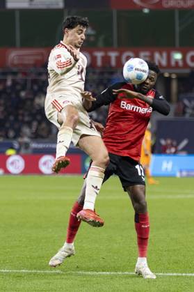 Aleksandar Pavlovic FC Bayern Munich, 45 , Edmond Tapsoba Bayer 04 Leverkusen, 12 Leverkusen, Soccer 1 Bundesliga 22 Matchday, Matchday 22, Bayer 04 Leverkusen FC Bayern Munich, 15 02 2024, BayArena, Leverkusen DFL regulations prohibit any use of photographs as image sequences and or quasi video Â