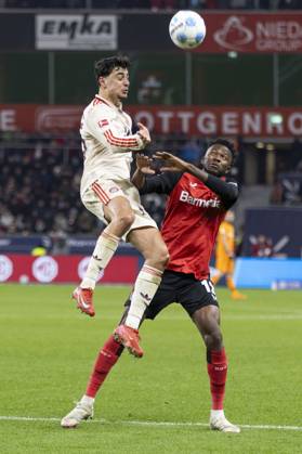 Aleksandar Pavlovic FC Bayern Munich, 45 , Edmond Tapsoba Bayer 04 Leverkusen, 12 Leverkusen, Soccer 1 Bundesliga 22 Matchday, Matchday 22, Bayer 04 Leverkusen FC Bayern Munich, 15 02 2024, BayArena, Leverkusen DFL regulations prohibit any use of photographs as image sequences and or quasi video Â