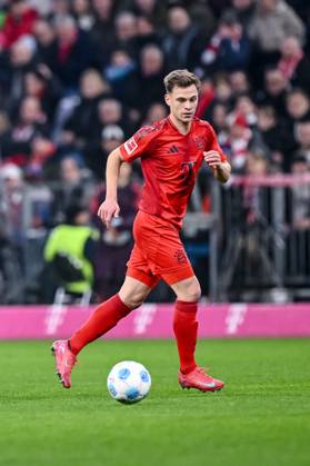 Joshua Kimmich FC Bayern Muenchen in action, on the ball, single action during the Bundesliga 1 match between FC Bayern München and Eintracht Frankfurt, Allianz Arena on February 23, 2025 in Munich, Germany Photo by Harry Langer DeFodi Images Joshua Kimmich FC Bayern Muenchen controls the Ball during the Bundesliga match between FC Bayern München and Eintracht Frankfurt at Allianz Arena on February 23, 2025 in Munich, Germany Photo by Harry Langer DeFodi Images DFL regulations prohibit any use of photographs as image sequences and or quasi video Photo by Harry Langer DeFodi Images DFL regulations prohibit any use of photographs as image sequences and or quasi video