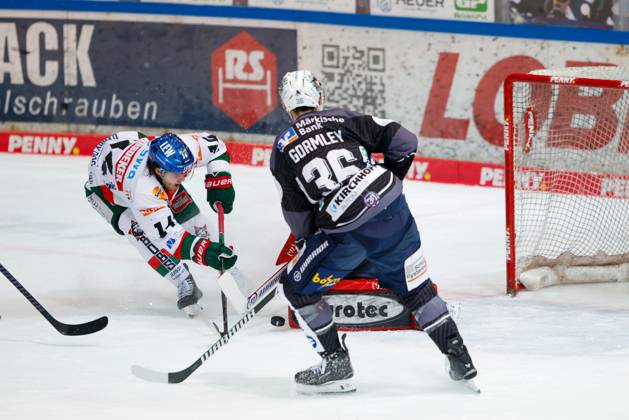 in duel, action, with D J Busdeker 14 Augsburger Panther , Brandon Gormley 36 Iserlohn Roosters , Iserlohn Roosters vs Augsburger Panther, Ice Hockey, 52 Matchday, Penny DEL, 07 03 2025 Iserlohn Nordrhein Westfalen Germany Copyright: xkolbert-press JanxBrüggemannx