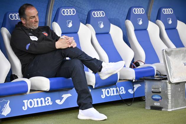before the start of the match Coach Frank Schmidt 1 FC Heidenheim 1846 FCH sits on the bench TSG 1899 Hoffenheim vs 1 FC Heidenheim 1846 FCH 09 03 2025 DFL REGULATIONS PROHIBIT ANY USE OF PHOTOGRAPHS AS IMAGE SEQUENCES AND OR QUASI VIDEO TSG 1899 Hoffenheim vs 1 FC Heidenheim 1846 FCH