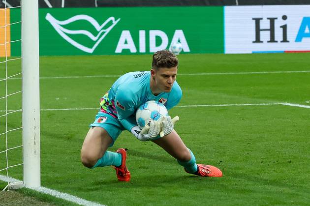 Goalkeeper action by Finn Dahmen FC Augsburg 1 , FC Augsburg vs VfL Wolfsburg, Football, Bundesliga, Matchday 26, 15 03 2025 DFB regulations prohibit any use of photographs as image sequences and or quasi video Augsburg Bayern Germany Copyright: xkolbert-press xMartinxAgüerax