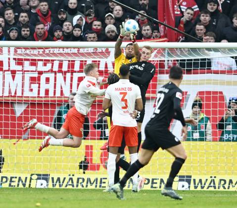 Soccer Bundesliga Season 2024 2025 Mewa Arena Mainz 15 03 2025 1 FSV Mainz 05 mz FC Freiburg fr 2 2 V li Jonathan BURKARDT 1 FSV Mainz 05 , Moritz JENZ 1 FSV Mainz 05 , Goalkeeper Noah ATUBOLU SC Freiburg Vincenzo GRIFFO SC Freiburg DFL REGULATIONS PROHIBIT ANY USE OF PHOTOGRAPHS AS IMAGE SEQUENCES AND OR QUASI VIDEO EDITORIAL USE ONLY NATIONAL AND INTERNATIONAL NEWS AGENCIES OUT Soccer Bundesliga 1 FSV Mainz 05