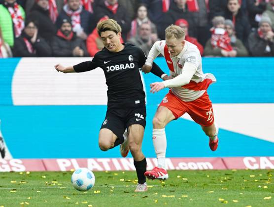Soccer Bundesliga Season 2024 2025 Mewa Arena Mainz 15 03 2025 1 FSV Mainz 05 mz FC Freiburg fr 2 2 Ritsu DOAN SC Freiburg , li Andreas HANCHE OLSEN 1 FSV Mainz 05 DFL REGULATIONS PROHIBIT ANY USE OF PHOTOGRAPHS AS IMAGE SEQUENCES AND OR QUASI VIDEO EDITORIAL USE ONLY NATIONAL AND INTERNATIONAL NEWS AGENCIES OUT Soccer Bundesliga 1 FSV Mainz 05