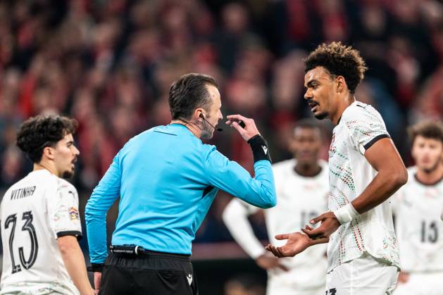 Denmark v Portugal, UEFA Nations League, Copenhagen, Denmark Copenhagen, Denmark. 20th, March 2025. Renato Veiga (13) of Portugal seen with referee Irfan Peljto during the UEFA Nations League play-off match between Denmark and Portugal at Parken in Copenhagen. Denmark, Copenhagen Copyright: xGonzalesxPhoto FrederikkexJensenx