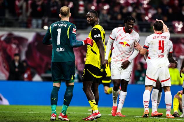 Serhou Guirassy Borussia Dortmund,9 and goalkeeper Peter Gulacsi RB Leipzig,1 1 Soccer Bundesliga Season 2024 2025 RB Leipzig vs Borussia Dortmund at the Red Bull Arena in Leipzig Action,Soccer,Germany,Man,Men,15 03 2025