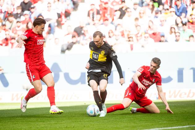 Maximilian Beier Borussia Dortmund, 14 in duel with Matthias Ginter SC Freiburg, 28 , GER, SC Freiburg SCF vs Borussia Dortmund BVB , Soccer Bundesliga, 28 Matchday, Season 2024 2025, 05 04 2025 DFB DFL regulations prohibit any use of photographs as image sequences and or quasi video GER, SC Freiburg SCF vs Borussia Dortmund BVB , Soccer Bundesliga, 28 Matchday, Season 2024 2025, 05 04 2025 Freiburg Copyright: xEibner-Pressefoto Memmlerx EP_MMR