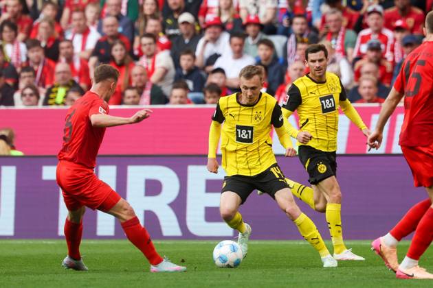 in duel, action, with Joshua Kimmich 6 FC Bayern Muenchen , Maximilian Beier 14 Borussia Dortmund , FC Bayern Muenchen vs Borussia Dortmund, Football, 1 Bundesliga, 29 Matchday, 12 04 2025 DFB regulations prohibit any use of photographs as image sequences and or quasi video Muenchen Bayern Germany Copyright: xkolbert-press ChristianxKolbertx