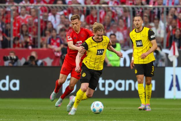 in duel, action, with Joshua Kimmich 6 FC Bayern Muenchen , Julian Brandt 10 Borussia Dortmund , FC Bayern Muenchen vs Borussia Dortmund, Football, 1 Bundesliga, 29 Matchday, 12 04 2025 DFB regulations prohibit any use of photographs as image sequences and or quasi video Muenchen Bayern Germany Copyright: xkolbert-press ChristianxKolbertx