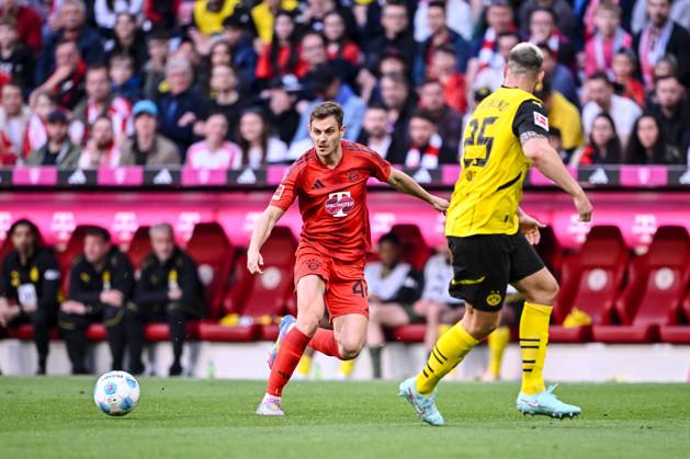 Josip Stanisic FC Bayern Muenchen and Niklas Suele BV Borussia Dortmund in a duel during the Bundesliga match between FC Bayern München and Borussia Dortmund, Allianz Arena on April 12, 2025 in Munich, Germany Photo by Harry Langer DeFodi Images Josip Stanisic FC Bayern Muenchen and Niklas Suele BV Borussia Dortmund battle for the ball during the Bundesliga match between FC Bayern München and Borussia Dortmund at Allianz Arena on April 12, 2025 in Munich, Germany Photo by Harry Langer DeFodi Images DFL regulations prohibit any use of photographs as image sequences and or quasi video Photo by Harry Langer DeFodi Images DFL regulations prohibit any use of photographs as image sequences and or quasi video