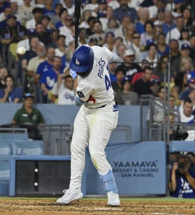 Los Angeles Dodgers center fielder Andy Pages is hit by a pitch in the fourth inning by San Diego Padres starting pitcher Dylan Cease at Dodger Stadium in Los Angeles on Monday, June 16, 2025. LAP2025061625 JIMxRUYMEN