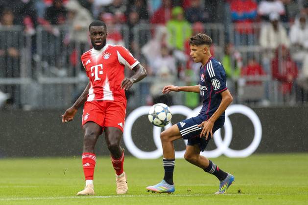 in duel, action, with Dayot Upamecano 2 FC Bayern Muenchen Khalis Merah 44 Olympique Lyon , FC Bayern Muenchen vs Olympique Lyon, Football, 1 Bundesliga, Test match, 02 08 2025 DFB regulations prohibit any use of photographs as image sequences and or quasi video Muenchen Bayern Germany Copyright: xkolbert-press ChristianxKolbertx