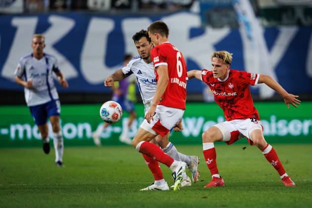 Adrian Gantenbein FC Schalke 04 in duel with Mika Haas 1 FC Kaiserslautern and Fabian Kunze 1 FC Kaiserslautern , 1 FC Kaiserslautern vs FC Schalke 05, Soccer, 2 Bundesliga, Matchday 2, Season 2025 2026, 09 08 2025 1 FC Kaiserslautern vs FC Schalke 05, Soccer, 2 Bundesliga, Matchday 2, Season 2025 2026, 09 08 2025 Copyright: xEibner-Pressefoto AlexanderxNeisx EP_ANS