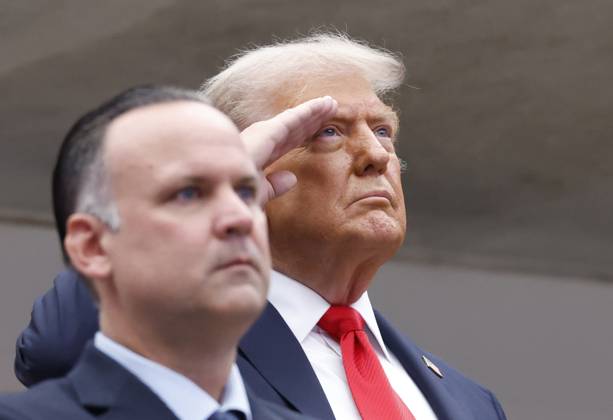 President Donald Trump salutes during the playing of the National Anthem before Jannik Sinner of Italy plays Carlos Alcaraz of Spain in the Men s Finals of the 2025 US Open Tennis Championship in Arthur Ashe Stadium at the USTA Billie Jean King National Tennis Center in Flushing Meadows, New York, on Sunday, September 7, 2025. NYP20250907116 COREYxSIPKIN