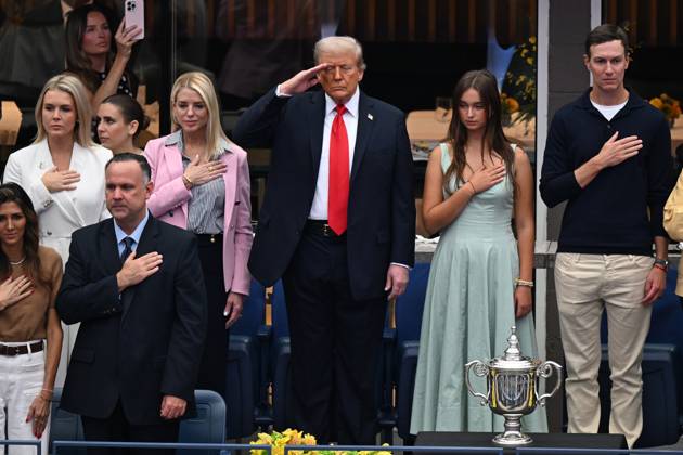 President Donald Trump salutes during the National Anthem before watching Jannik Sinner of Italy play Carlos Alcaraz of Spain in the Men s Finals of the 2025 US Open Tennis Championship in Arthur Ashe Stadium at the USTA Billie Jean King National Tennis Center in Flushing Meadows, New York, on Sunday, September 7, 2025. NYP20250907202 LARRYxMARANO