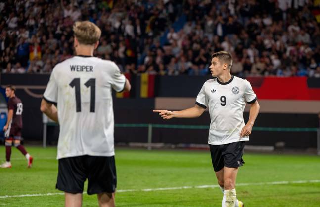 Soccer, Youth, Season 2025 26, U21, European Championship Qualification Group F 3 Matchday in Rostock, Germany Latvia, f l Nelson Weiper U21, Germany , Nicolo Tresoldi U21, Germany , Cheering after scoring 2 0, 09 09 2025, Copyright: xMatthiasxKochx