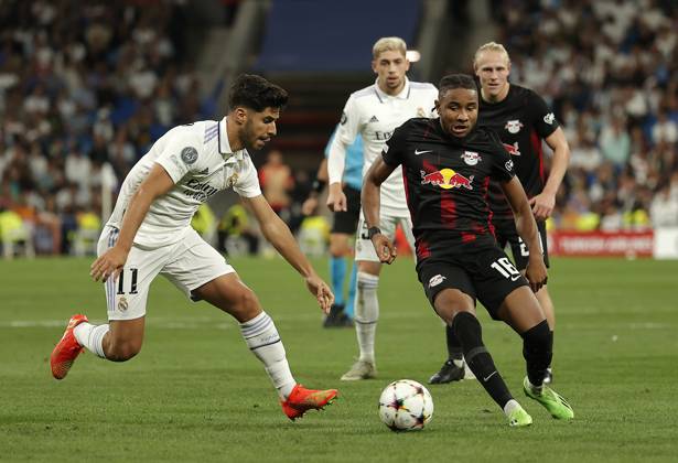 Real Madrid v RB Leipzig - UEFA Champions League MADRID, SPAIN - SEPTEMBER 14: Marco Asensio (L) of Real Madrid in action against Christopher Nkunku (R) of RB Leipzig during the UEFA Champions League Group F soccer match between Real Madrid and RB Leipzig at Santiago Bernabeu Stadium in Madrid, Spain on September 14, 2022. Madrid Spain. Editorial use only. Please get in touch for any other usage. Copyright: x2025xAnadoluxBurakxAkbulutx
