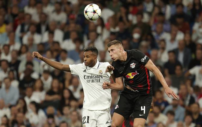 Real Madrid v RB Leipzig - UEFA Champions League MADRID, SPAIN - SEPTEMBER 14: Rodrygo (L) of Real Madrid in action against Willi Orban (R) of RB Leipzig during the UEFA Champions League Group F soccer match between Real Madrid and RB Leipzig at Santiago Bernabeu Stadium in Madrid, Spain on September 14, 2022. Madrid Spain. Editorial use only. Please get in touch for any other usage. Copyright: x2025xAnadoluxBurakxAkbulutx