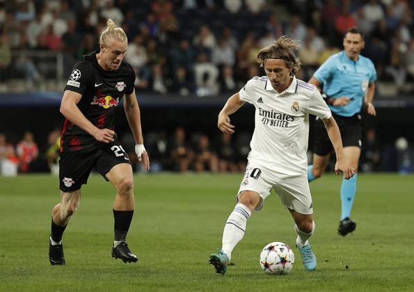 Real Madrid v RB Leipzig - UEFA Champions League MADRID, SPAIN - SEPTEMBER 14: Luka Modric (R) of Real Madrid in action against Xaver Schlager (L) of RB Leipzig during the UEFA Champions League Group F soccer match between Real Madrid and RB Leipzig at Santiago Bernabeu stadium in Madrid, Spain on 14 September 2022. Madrid Spain. Editorial use only. Please get in touch for any other usage. Copyright: x2025xAnadoluxBurakxAkbulutx