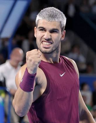 Tennis: Japan Open Carlos Alcaraz of Spain reacts after winning the first set in a men s singles second-round match against Zizou Bergs of Belgium at the Japan Open tennis tournament at Ariake Tennis Park in Tokyo on Sept. 27, 2025. A14AA0004889998P
