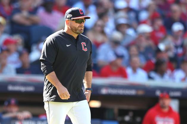 Cleveland Guardians manager Stephen Vogt (12) walks to the mound in the nseventh inning against the Detroit tigers during game one of the American League Wildcard at Progressive Field in Cleveland, Ohio on Tuesday, September 30, 2025. CLE20250930114 AARONxJOSEFCZYK